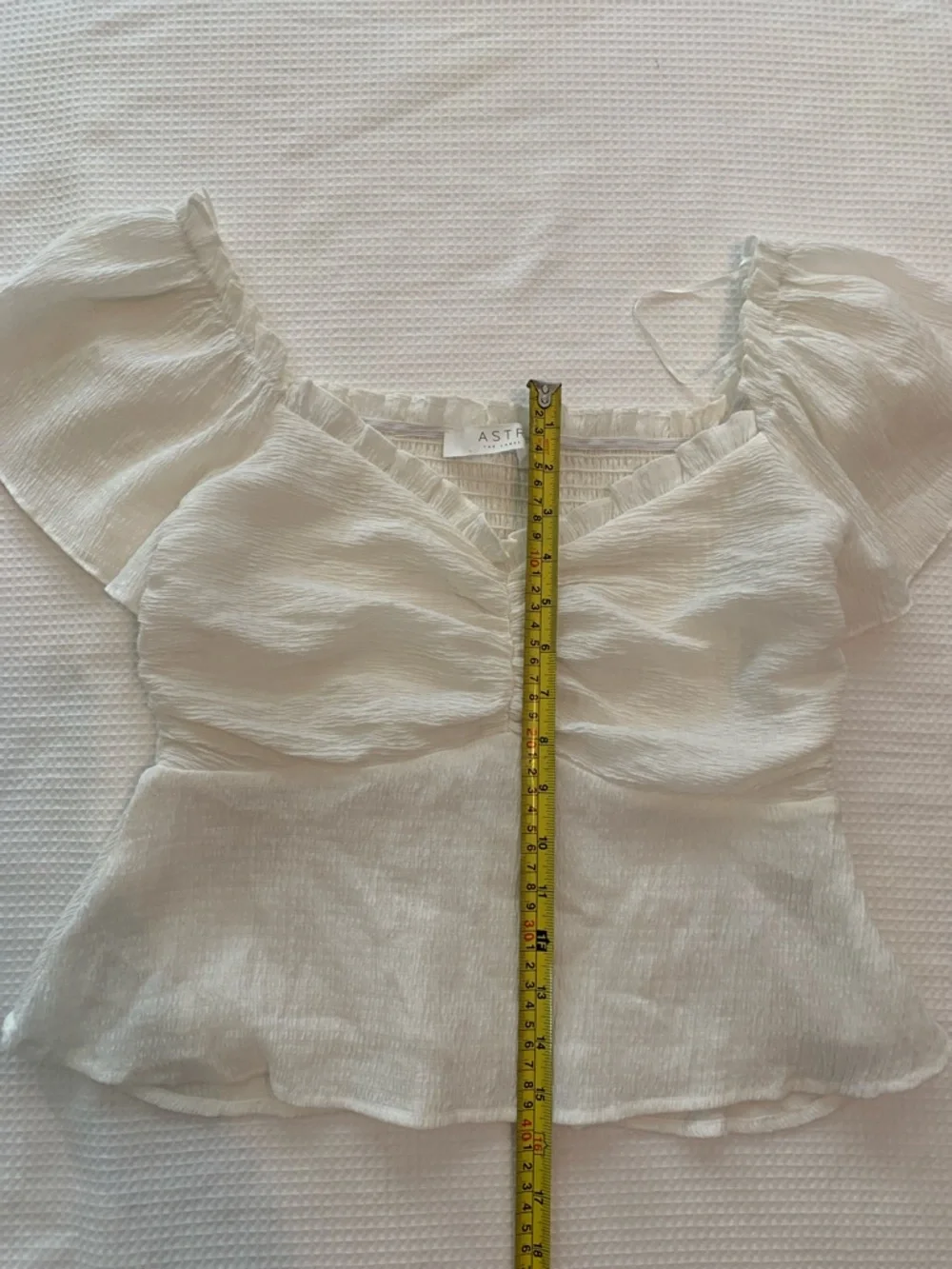 ASTR cream Textured Puff Sleeve Peplum Blouse size L